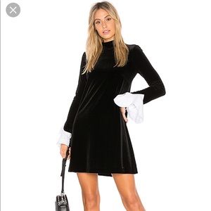 Stunning velvet dress with kerchief sleeves.